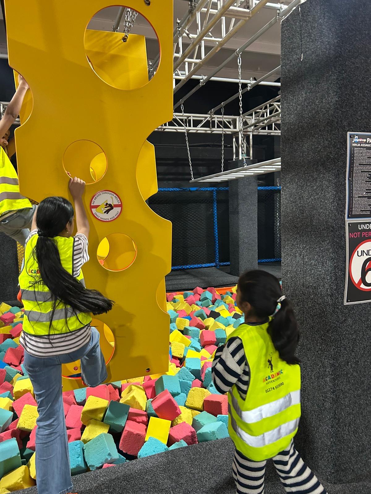 Academic Adventures children taking part in an indoor activity